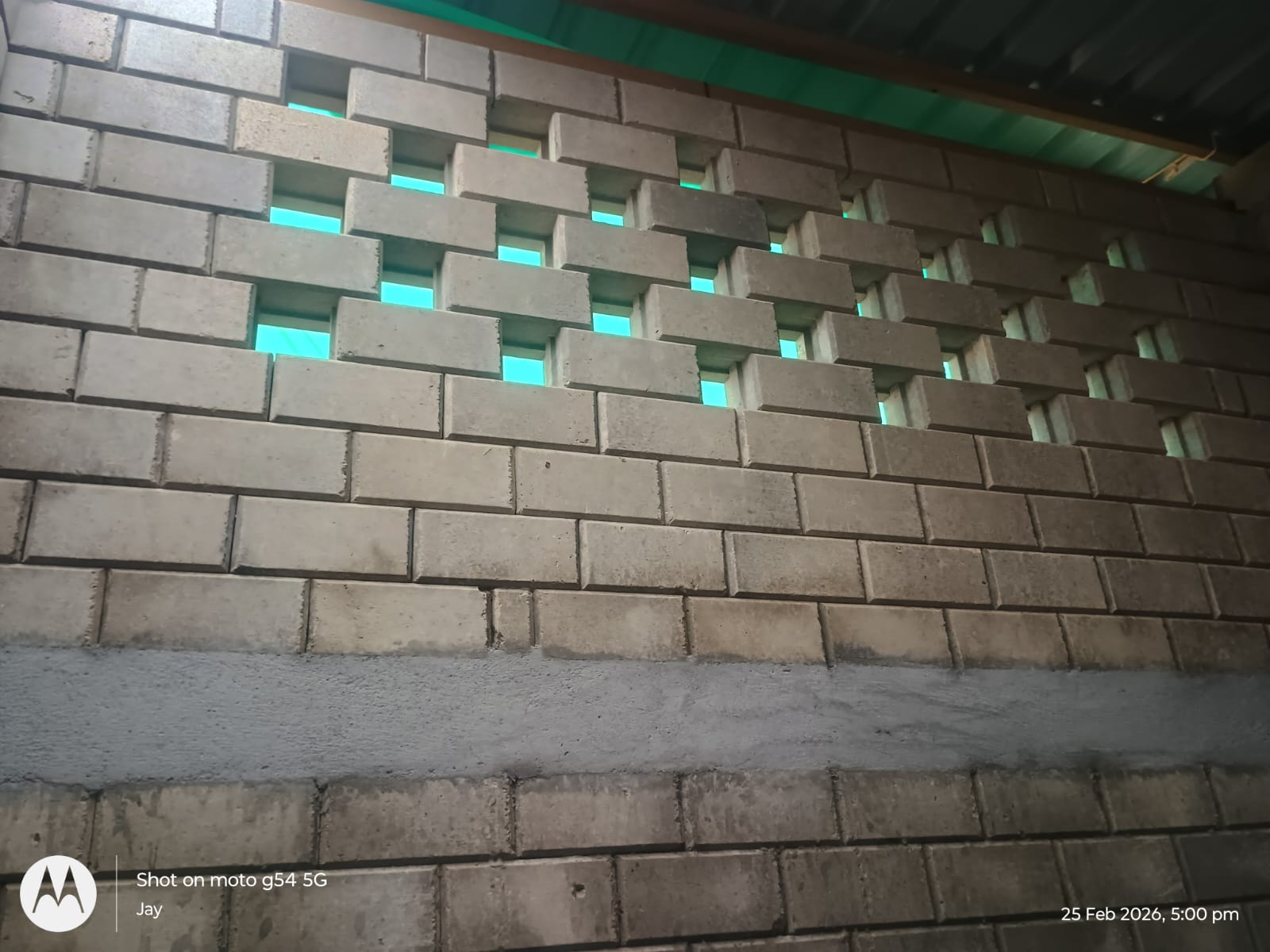 Tetris Brick House interlocking brick wall with decorative ventilation pattern